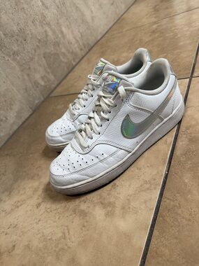 Nike White Low-Top Sneakers with Iridescent Swoosh